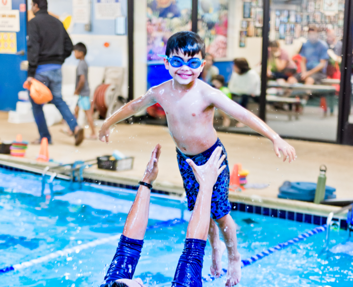 child-happy-in-air-700x569